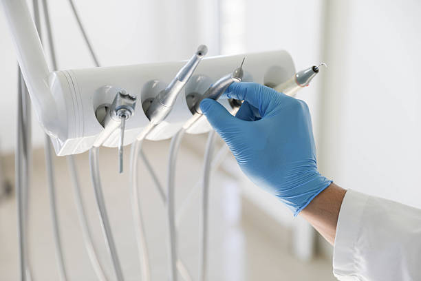 Professional Tooth Extraction technician working in East Bernard, TX
